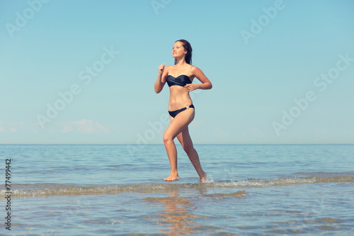 woman running in the water