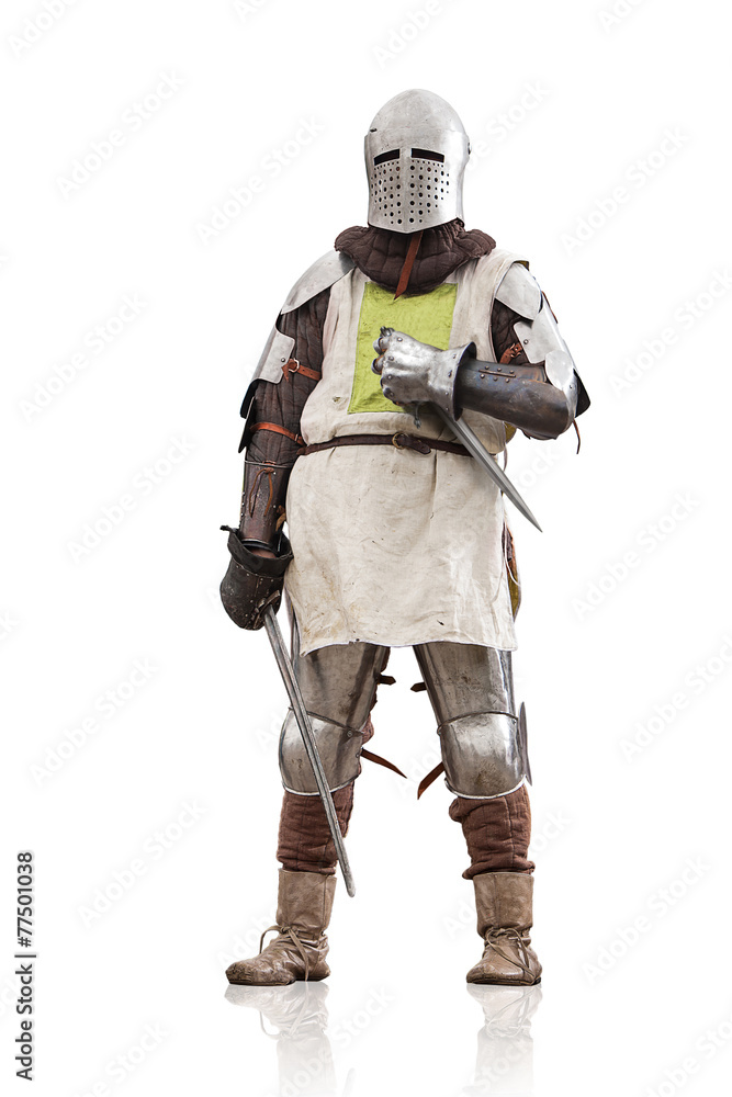 Medieval knight with the sword and dagger. Isolated on white. Medieval knight with the sword and dagger. Isolated on white.