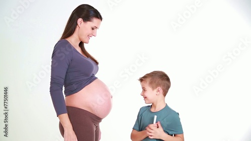 little artist depicted on his mom paunch his feelings