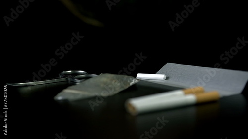 Wallpaper Mural Filter falls next to other smoking essentials Torontodigital.ca