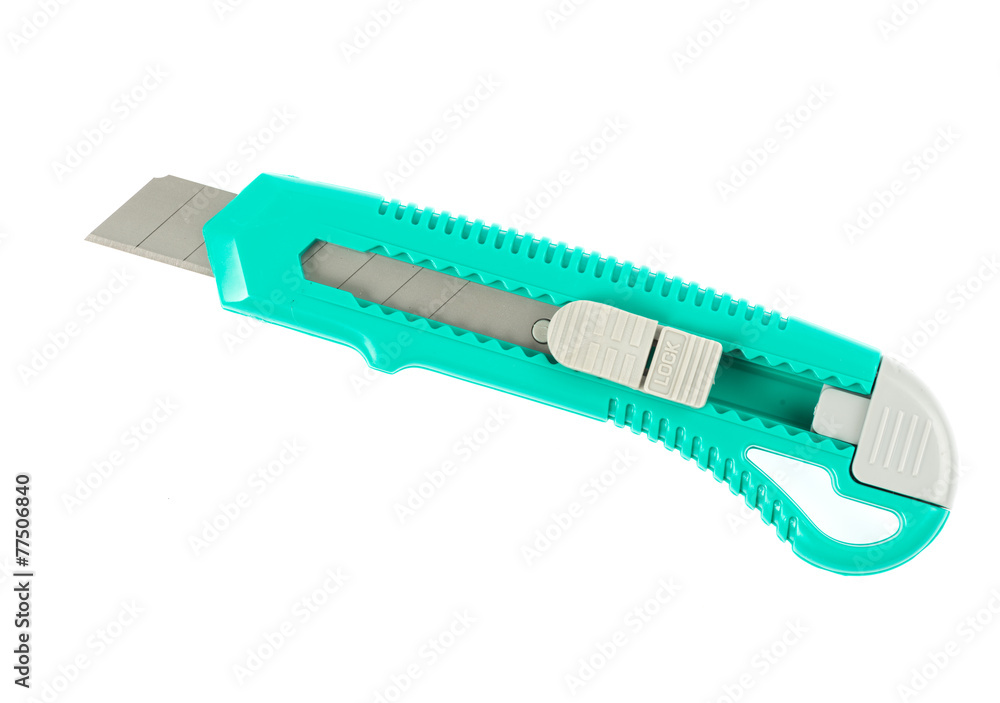 green paper knife on a white background green paper knife on a white background