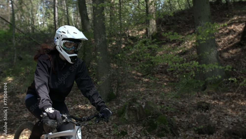 Downhill woman driver pass the camera Downhill woman driver pass the camera