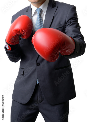 businessman with boxing glove ready to fight with work, business © num_skyman