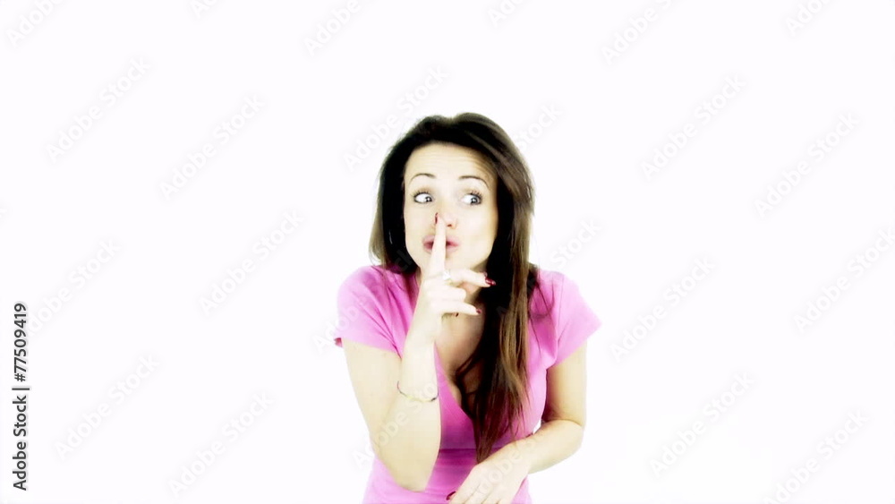 cute woman making silence sign