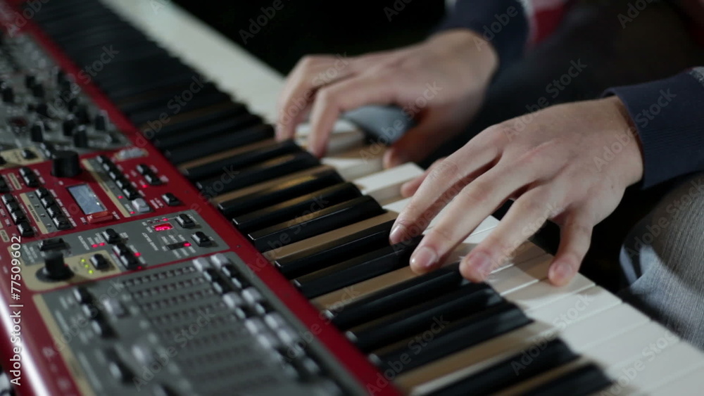 close up shot of musican playing keyboards close up shot of musican playing keyboards