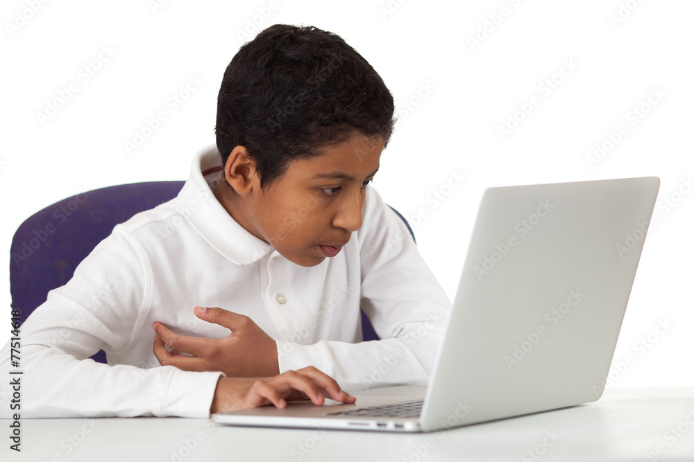 Hispanic Boy Studying with Laptop on White Background Hispanic Boy Studying with Laptop on White Background