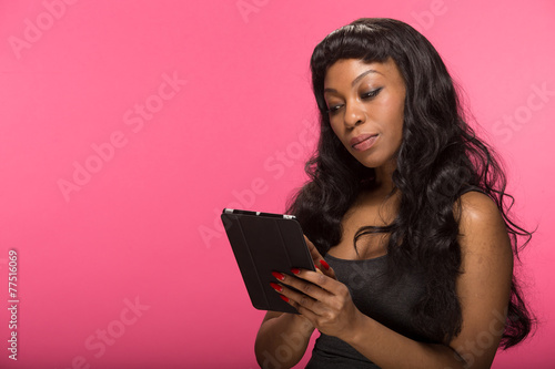African American black woman using tablet pc computer