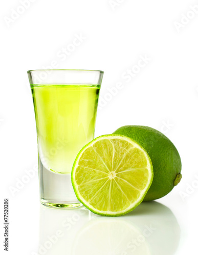 Tequila shot with lime isolated on white background