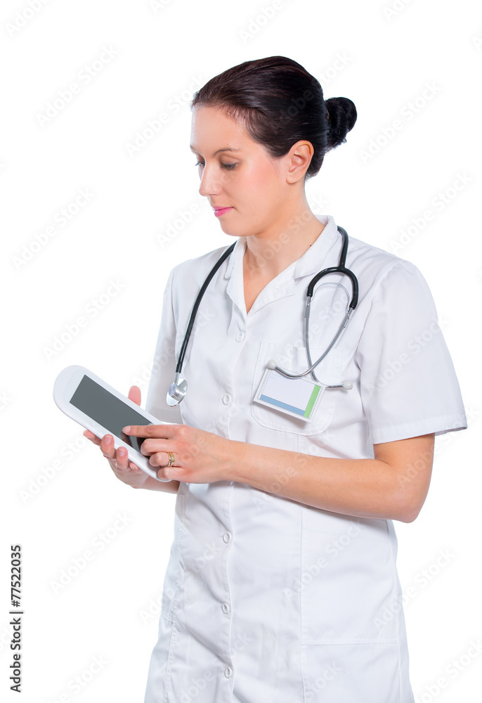 Woman doctor holding a tablet pc, isolated on white Woman doctor holding a tablet pc, isolated on white