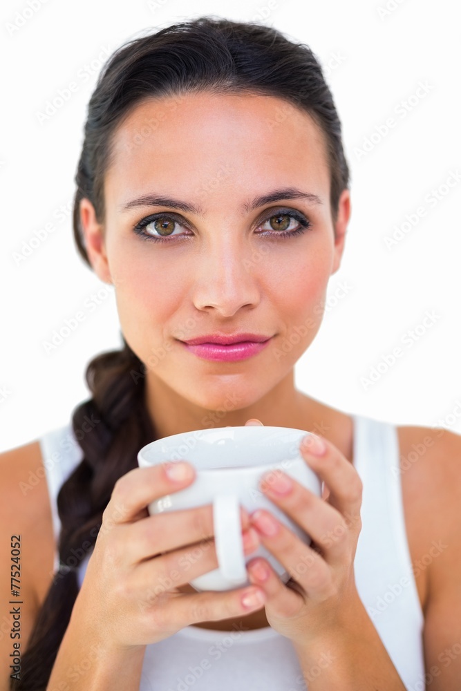 Pretty brunette having cup of tea Pretty brunette having cup of tea