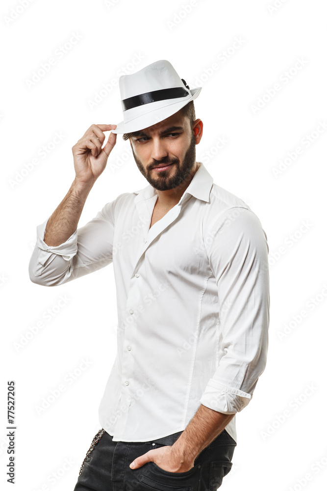 Bearded man with a hat posing in the studio Bearded man with a hat posing in the studio