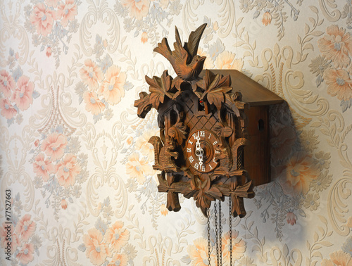 cuckoo clock on old wallpaper