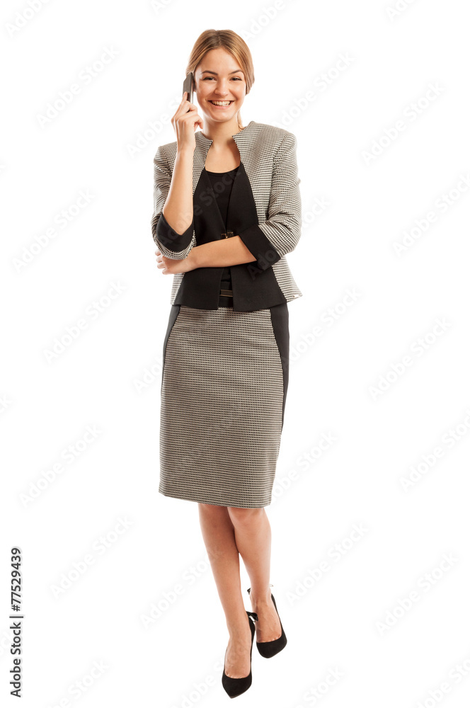Young and beautiful business woman talking on the phone Young and beautiful business woman talking on the phone