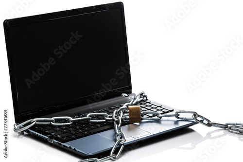 Padlock and chain on keyboard