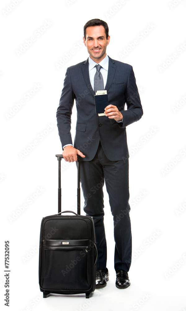 businessman with trolley and holding his passport businessman with trolley and holding his passport