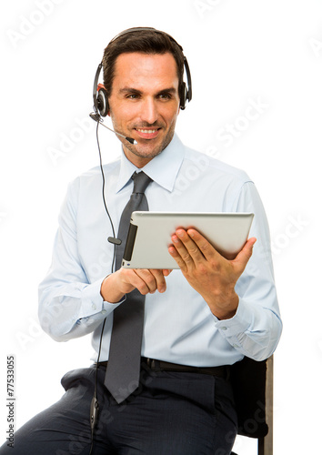 businessman with headset and digital tablet