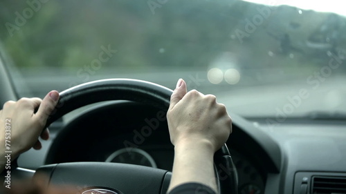 Wallpaper Mural Close shot of drivers hands on the steering wheel  Torontodigital.ca