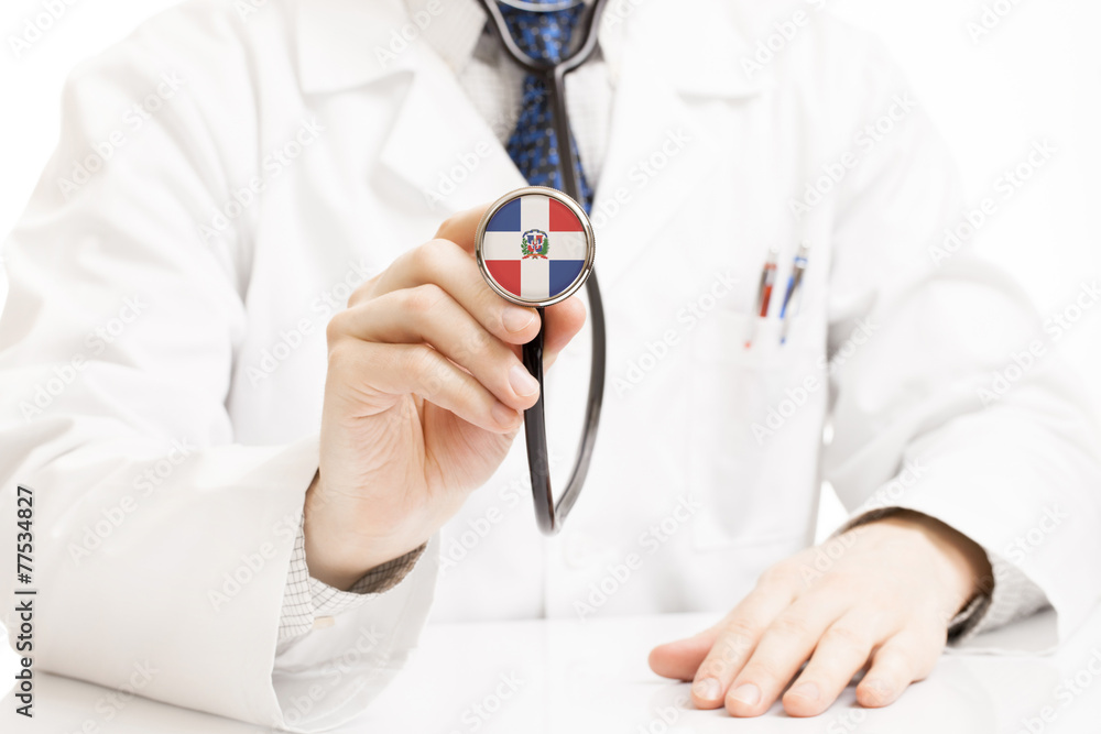 Doctor holding stethoscope with flag series - Dominican Republic Doctor holding stethoscope with flag series - Dominican Republic
