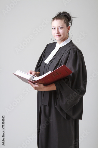 Holding a book of law