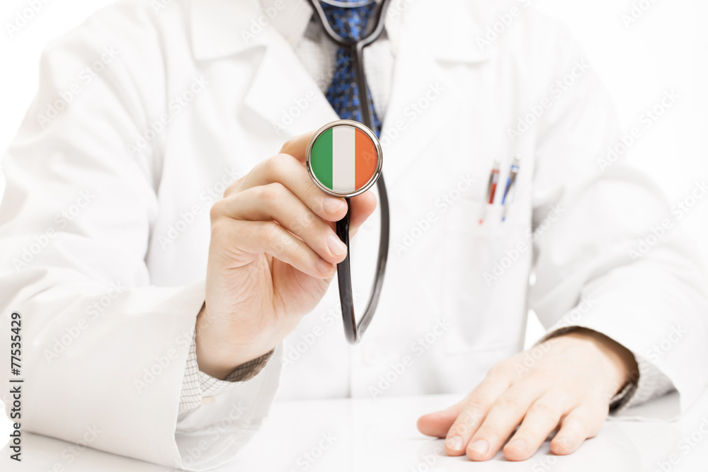 Doctor holding stethoscope with flag series - Ireland Doctor holding stethoscope with flag series - Ireland