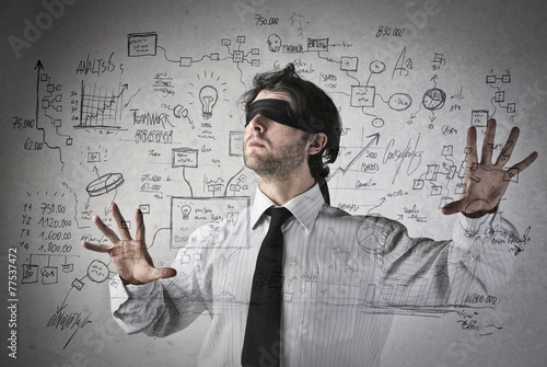 Fotografia Blind businessman making plans