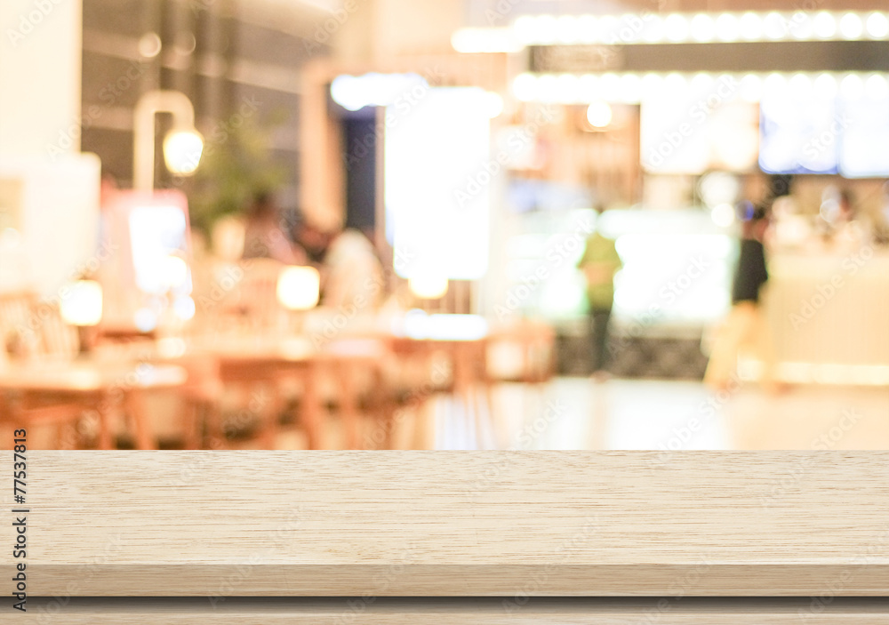 Empty wood table and blurred cafe with bokeh light background Empty wood table and blurred cafe with bokeh light background