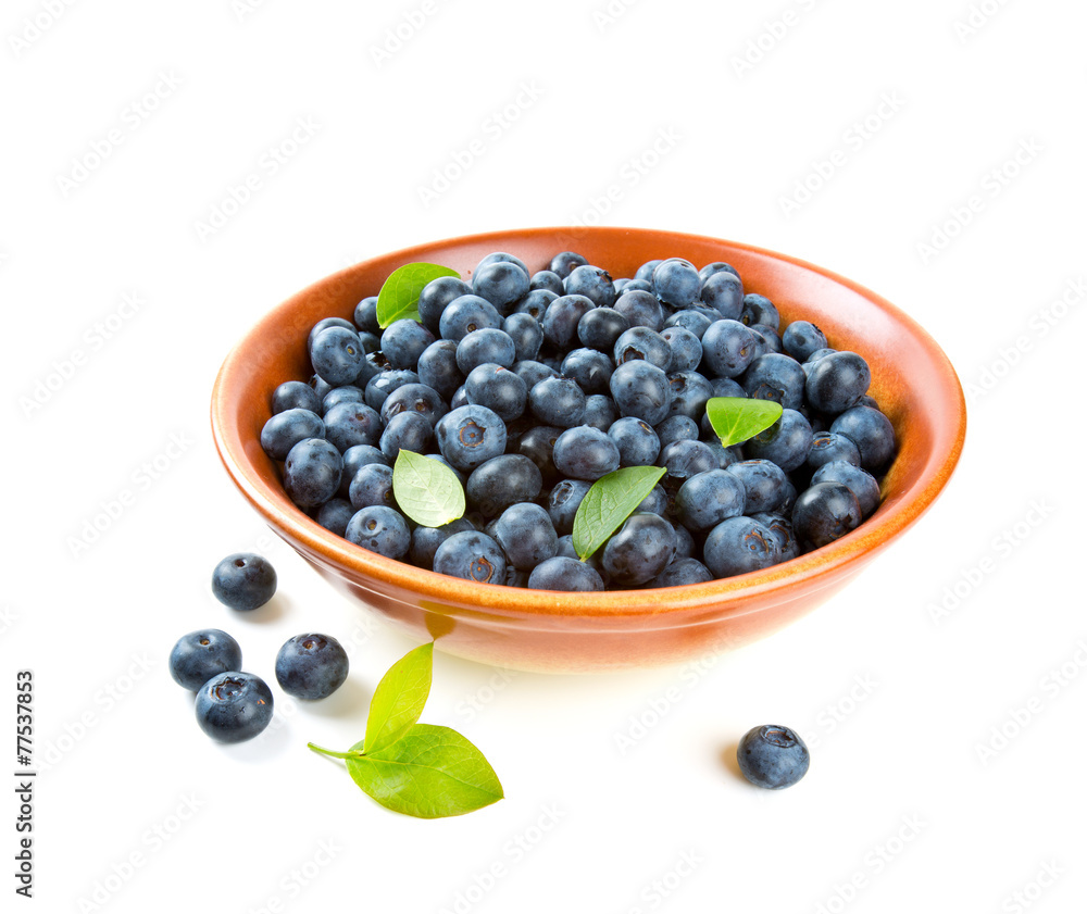 blueberries in a clay bowl