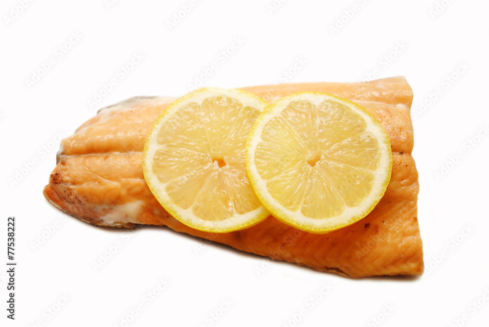 Fresh Lemon Slices on a Organic Salmon Steak Fresh Lemon Slices on a Organic Salmon Steak