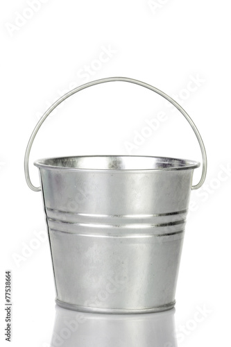 Metal bucket with clean water isolated on white background.
