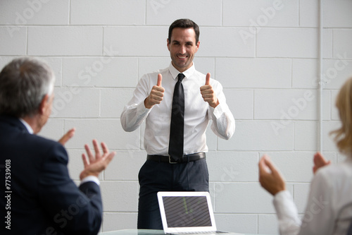 Three businesspeople during a meeting photo