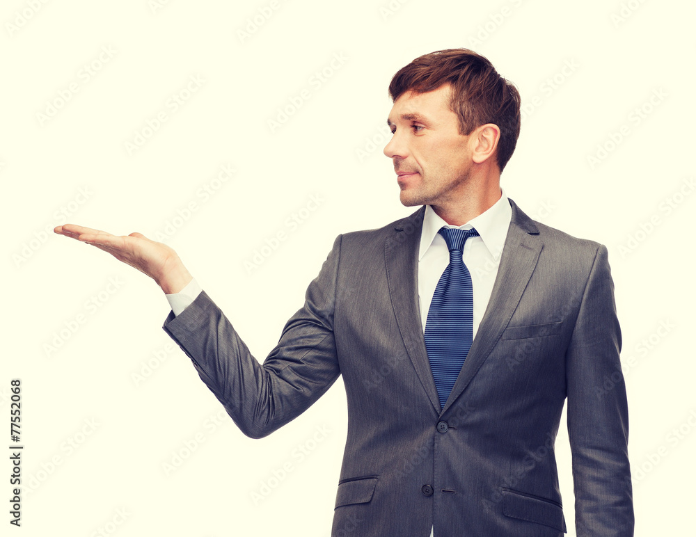 buisnessman or teacher showing something buisnessman or teacher showing something