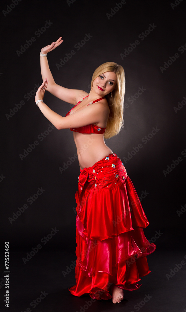 Beautiful bellydancer performing oriental dance Beautiful bellydancer performing oriental dance