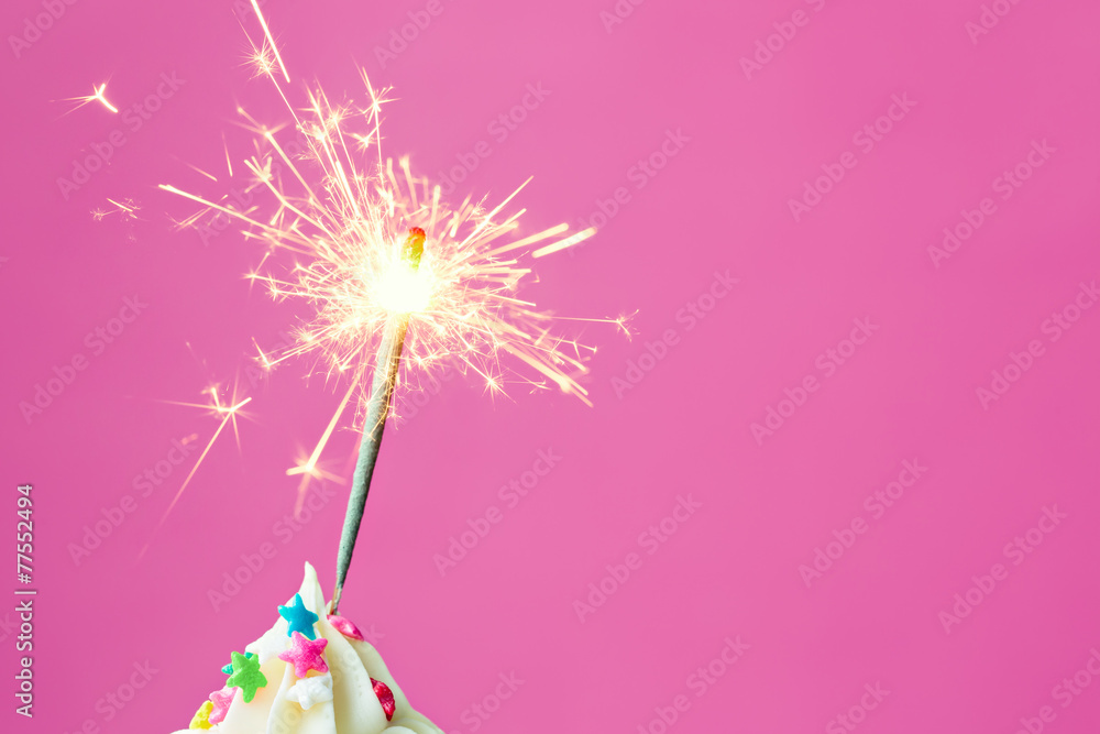 Sparkler on a cupcake Sparkler on a cupcake