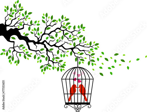 Tree silhouette with bird in a cage