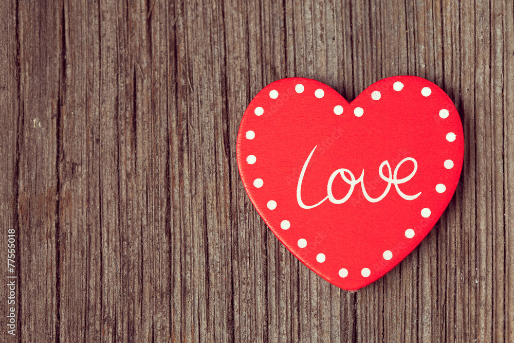 Red valentine's day heart on retro wooden background with vinta Red valentine's day heart on retro wooden background with vinta