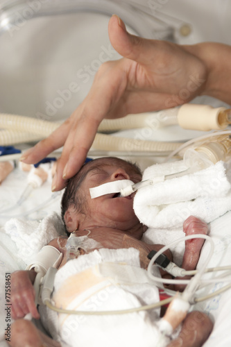 Newborn and hand