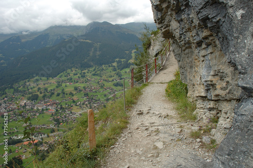 Trail in mountains nearby Grindelwald in Alps in Switzerland photo