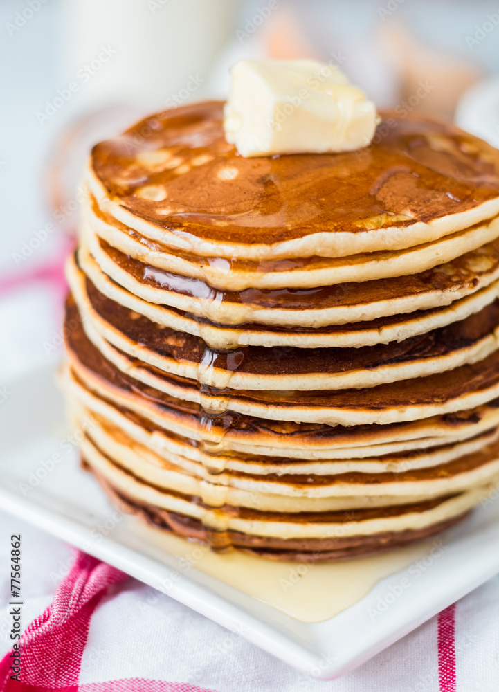 Pancake with butter and honey, a bottle of milk, dessert Pancake with butter and honey, a bottle of milk, dessert