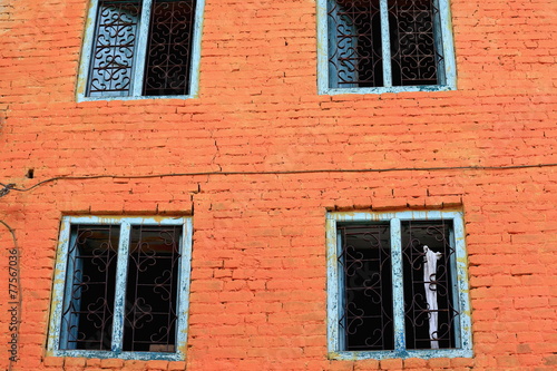 Blue windows-red brick facade-T.T.Yangtse-Namo Buddha-Npl. 1018 photo