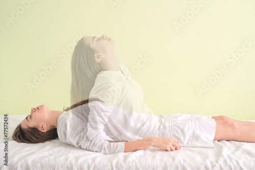 Photos Young girl is waking up again. When the soul leaves the body