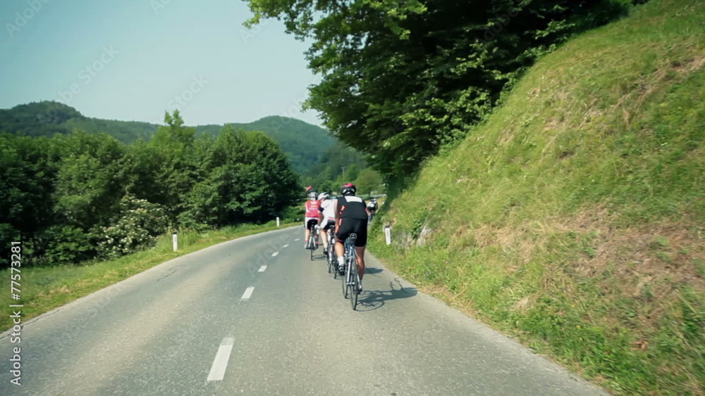 Following group of bicycle competitors Following group of bicycle competitors