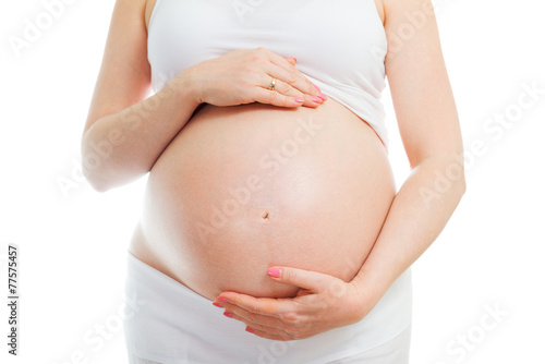 Big pregnant belly isolated on white background, healthy pregnancy concept