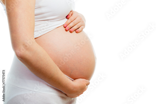 Side view of big pregnant belly isplated on white, healthy pregnancy concept