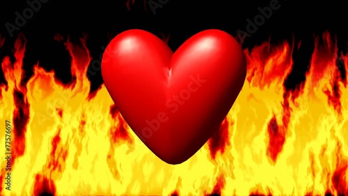 Burning heart in fire seamless loop video photo