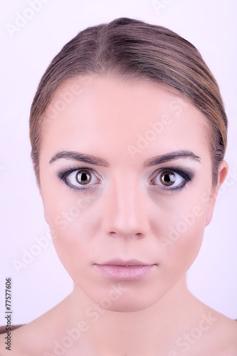 Make-up on young female fac...