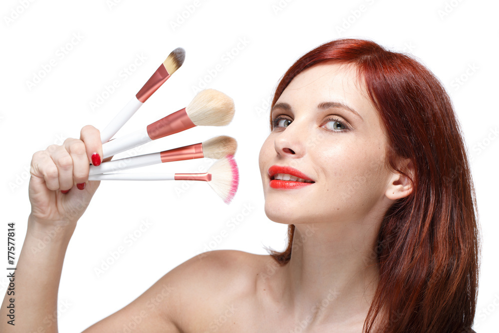 Woman with brushes for make-up.