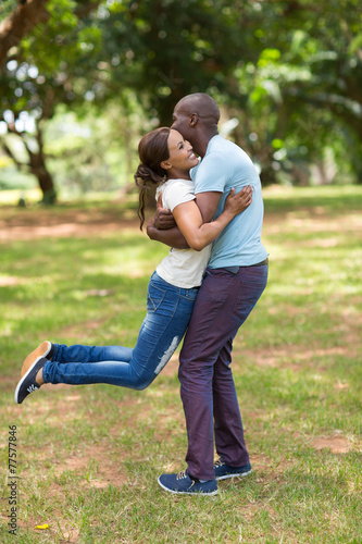 young african couple having fun in the park