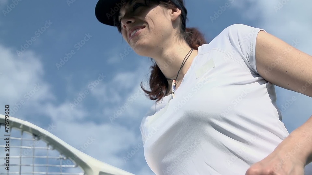 Female tennis player low angle shot slow motion Female tennis player low angle shot slow motion