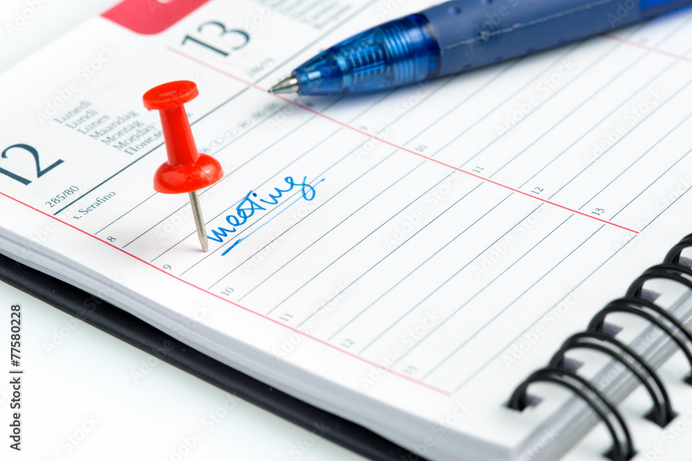 meeting appointment written on a weekly agenda meeting appointment written on a weekly agenda