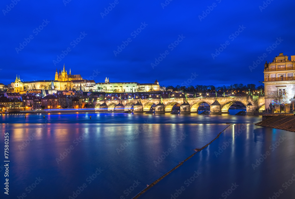 Evening view of the Prague castle, Charles bridge and the Vltava